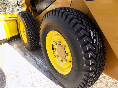 wolf paw skid steer tires|skidsteer snow tires.